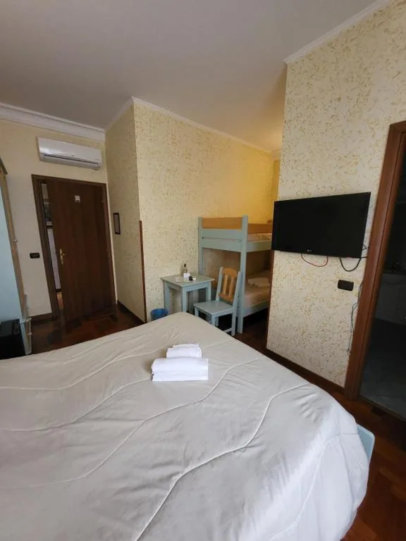Triple Room — St. Peter’s Rooms Rome