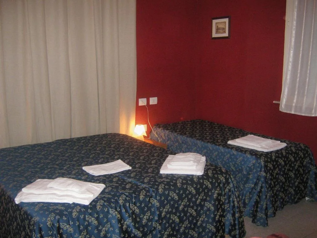 Standard Triple Room — Hotel Ferraro