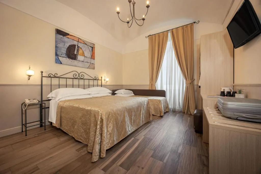 Standard Triple Room — Hotel Flavia