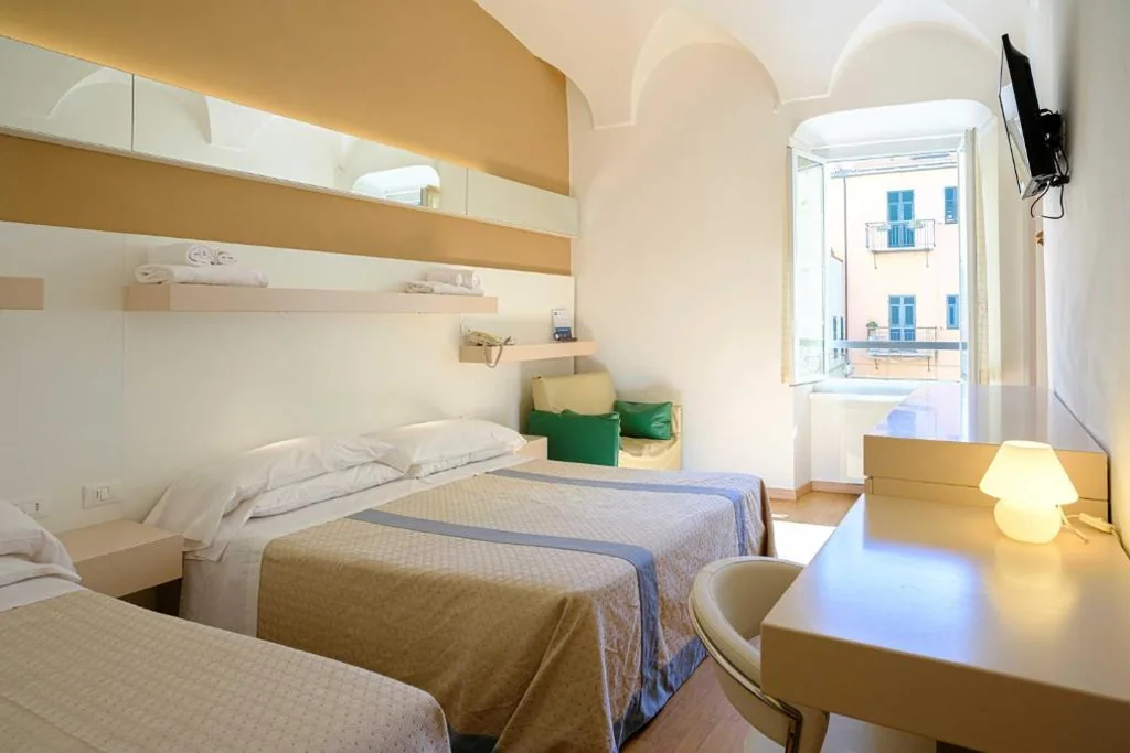 Standard Triple Room — Hotel Melograno