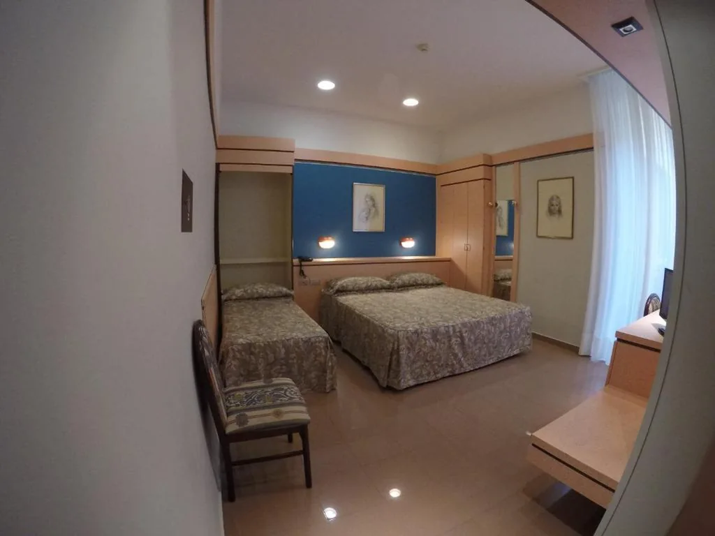 Standard Triple Room — Le Petit Hotel