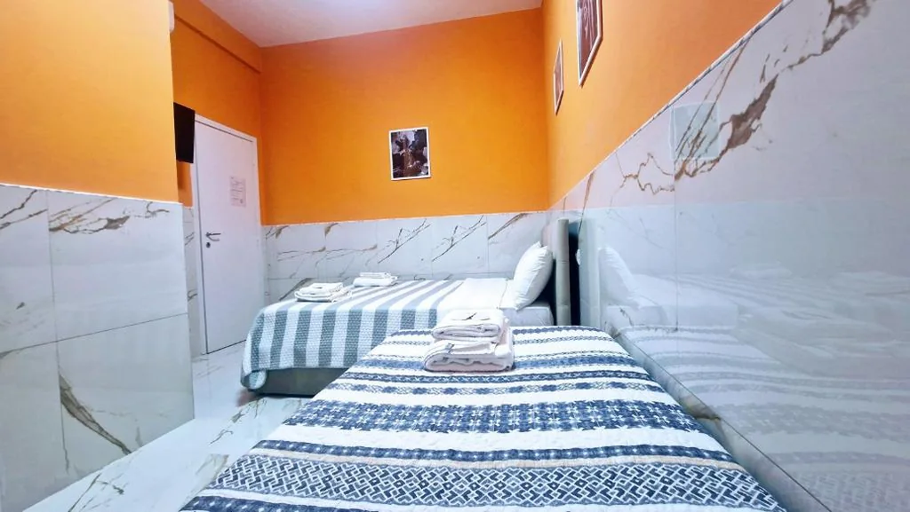 Standard Triple Room — Oscar Rooms