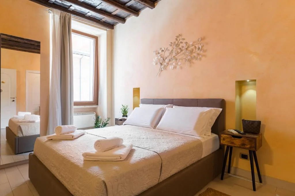 Camera Tripla Standard — TrinitaDeiMonti Guest House
