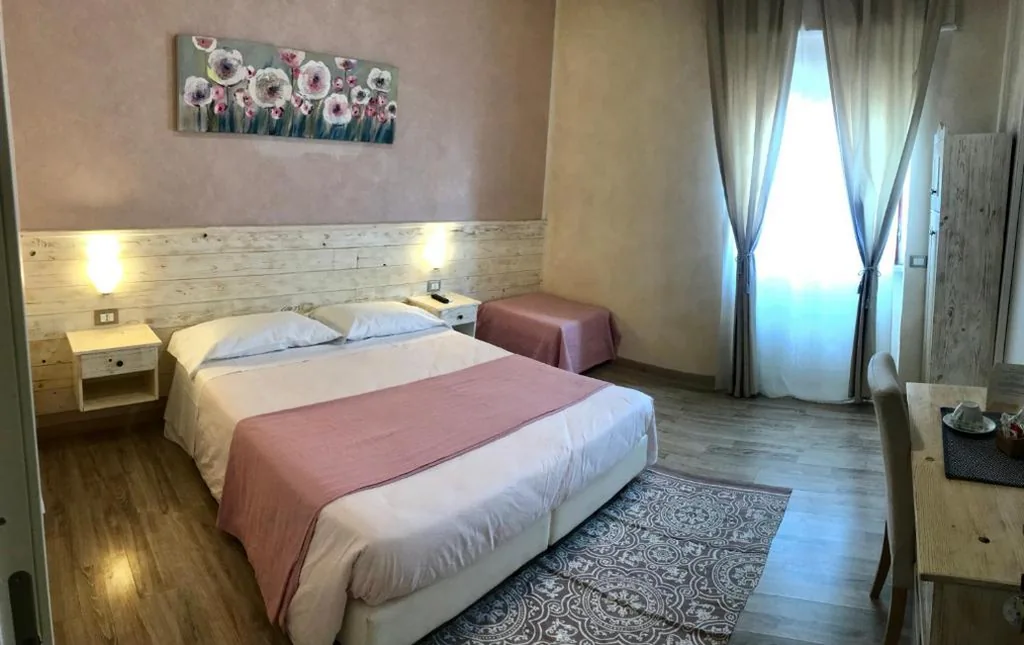 Camera Tripla Superior — Fiumicino Airport B&B Deluxe
