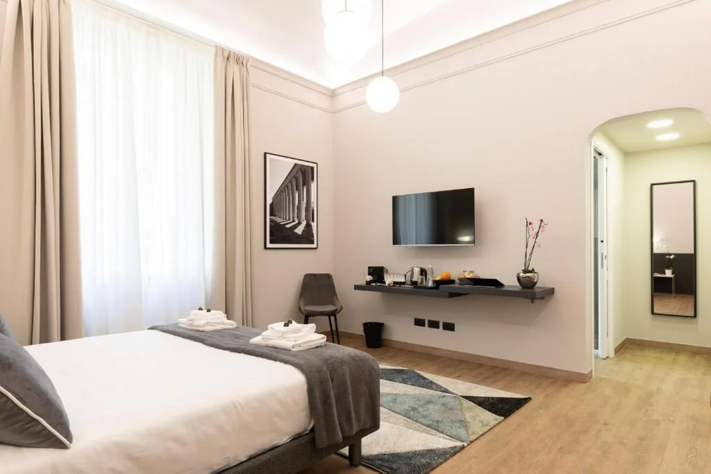 Camera Tripla Superior — Foresteria di Piazza Cavour – Luxury Suites & Guest House