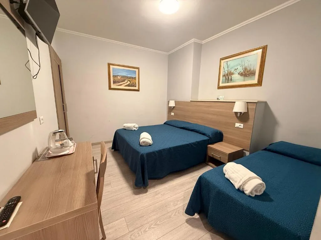 Camera Tripla Superior — HC Accomodation Corallo