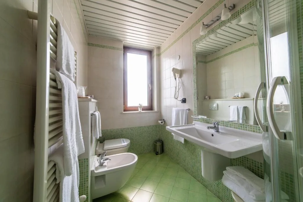 Camera Tripla Superior — Hotel Gardenia