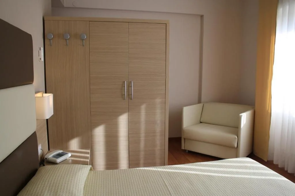 Camera Tripla Superior — Hotel Napoleon