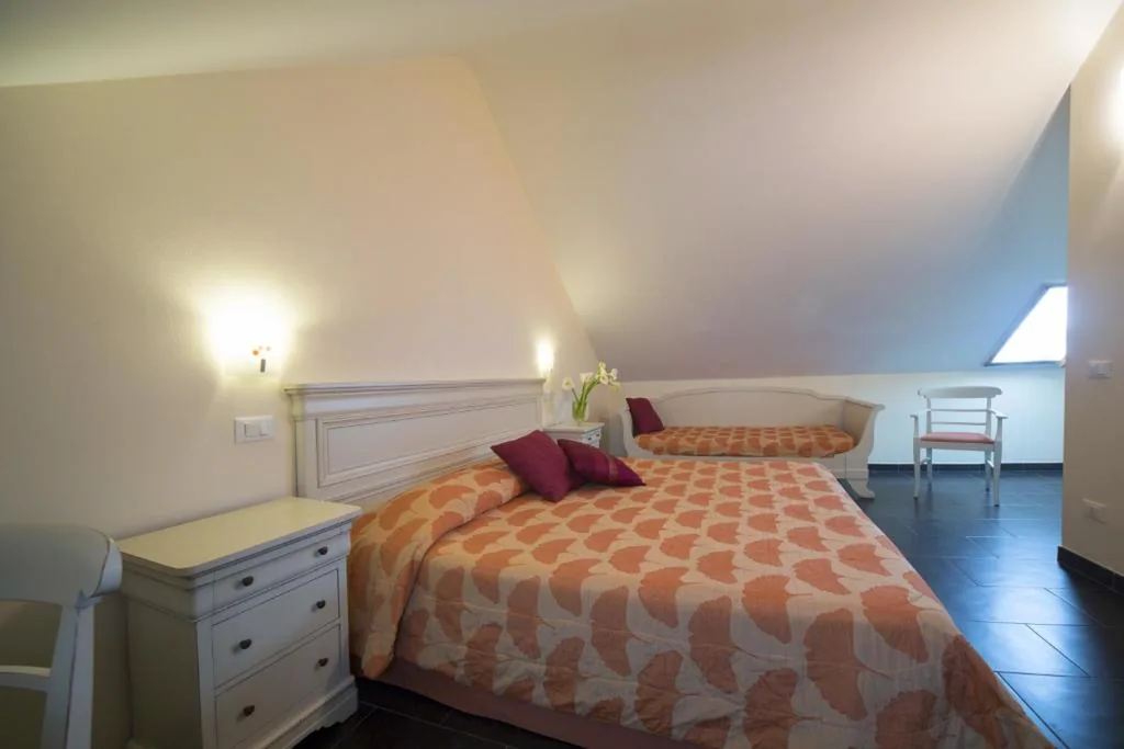 Superior Triple Room - Attic — Villa Imperiale Hotel