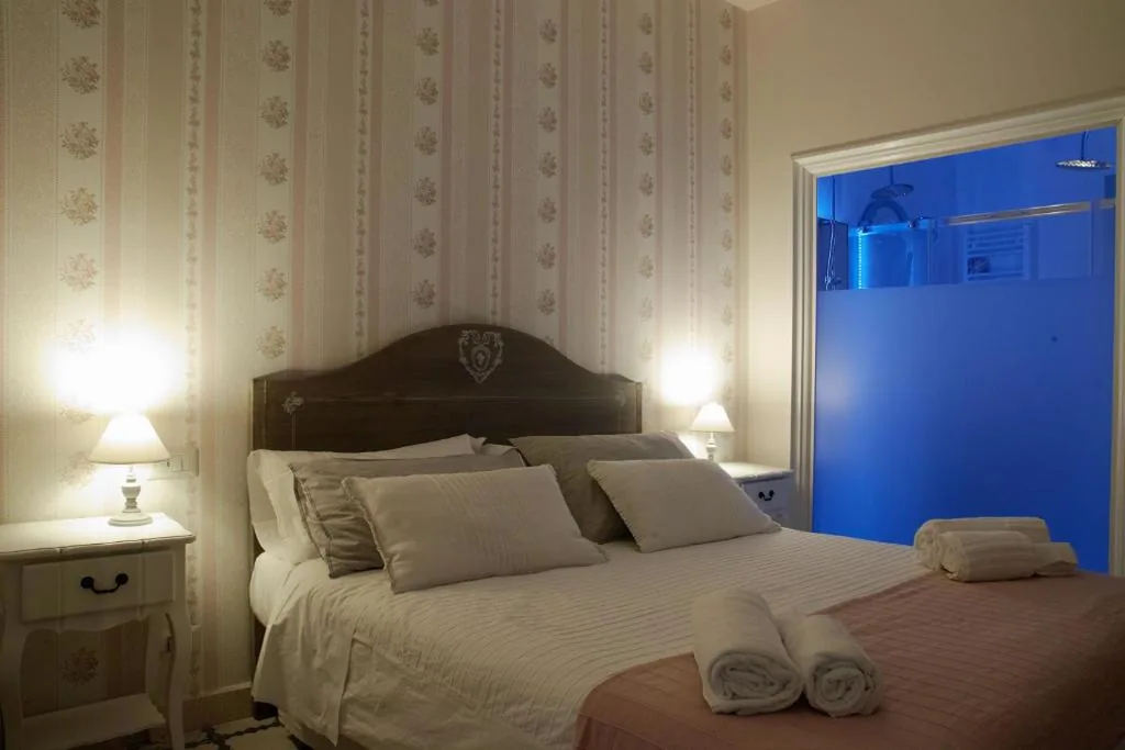 Camera Tripla Superior — PALAZZO ALESSANDRINI GUEST HOUSE