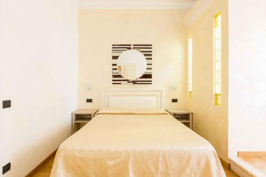 Camera Tripla Superior — Relais Calamatta