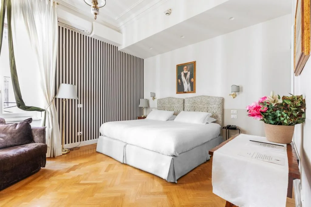 Camera Tripla Superior — Relais Donna Lucrezia
