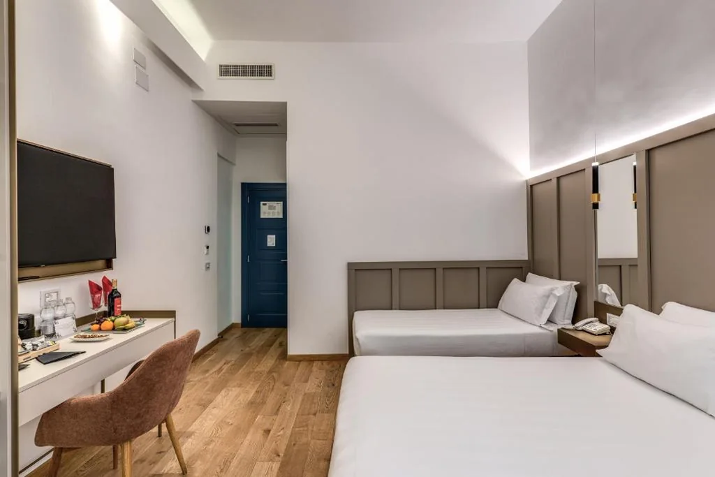 Camera Tripla Superior — Relais Trevi 95 Boutique Hotel