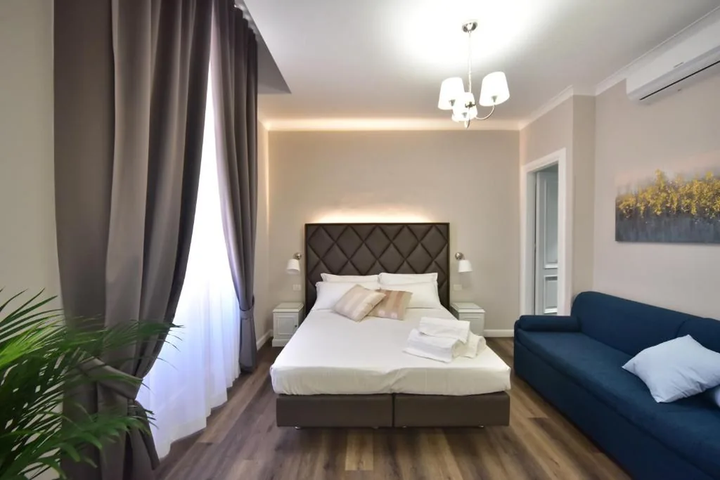 Camera Tripla Superior — Sacconi Palace Suite Roma