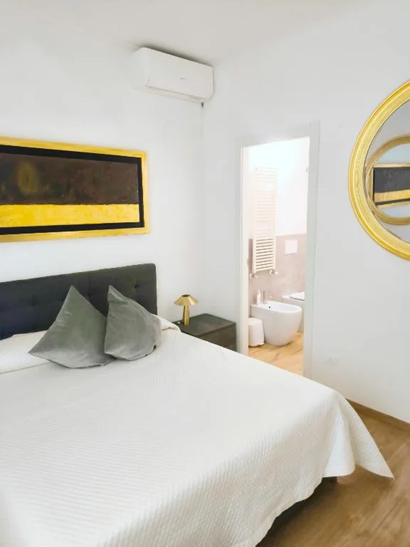 Appartamento “Laghetto 1” con tre camere e bagni privati cucina in condivisione — foto 7