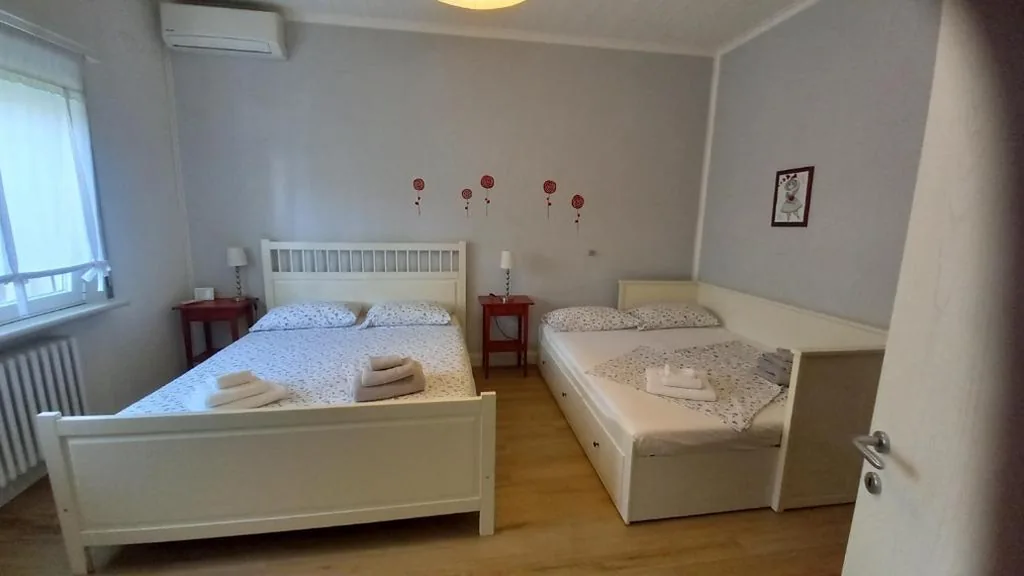 Camera Quadrupla Deluxe — B&B Nadine Forlì – boutique eco stay con parcheggio gratuito