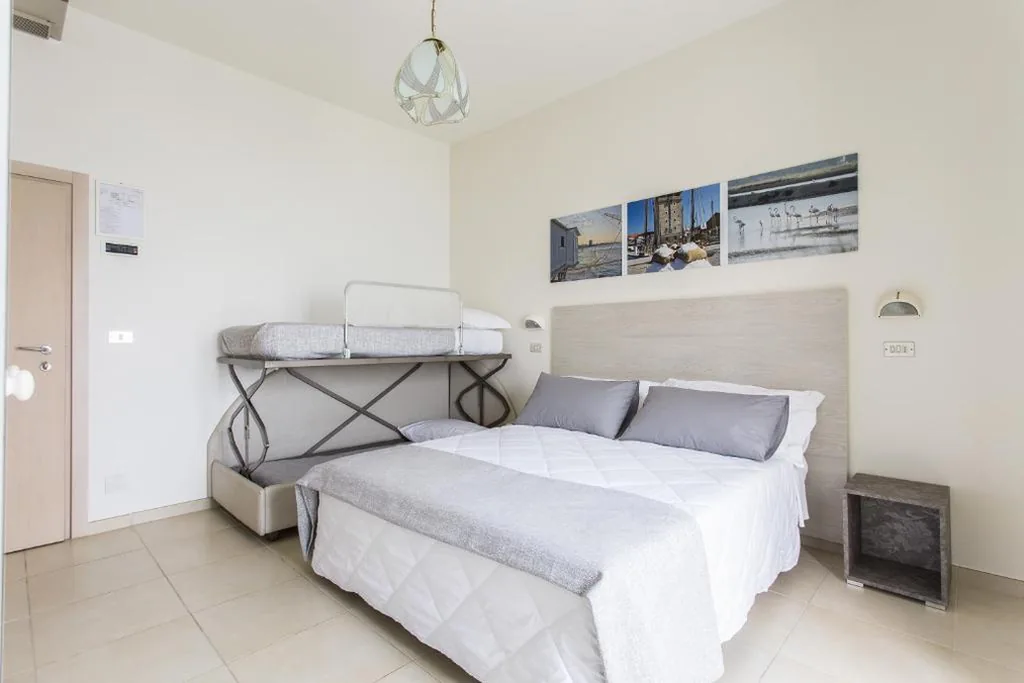 Quadruple Room — Hotel Caesar