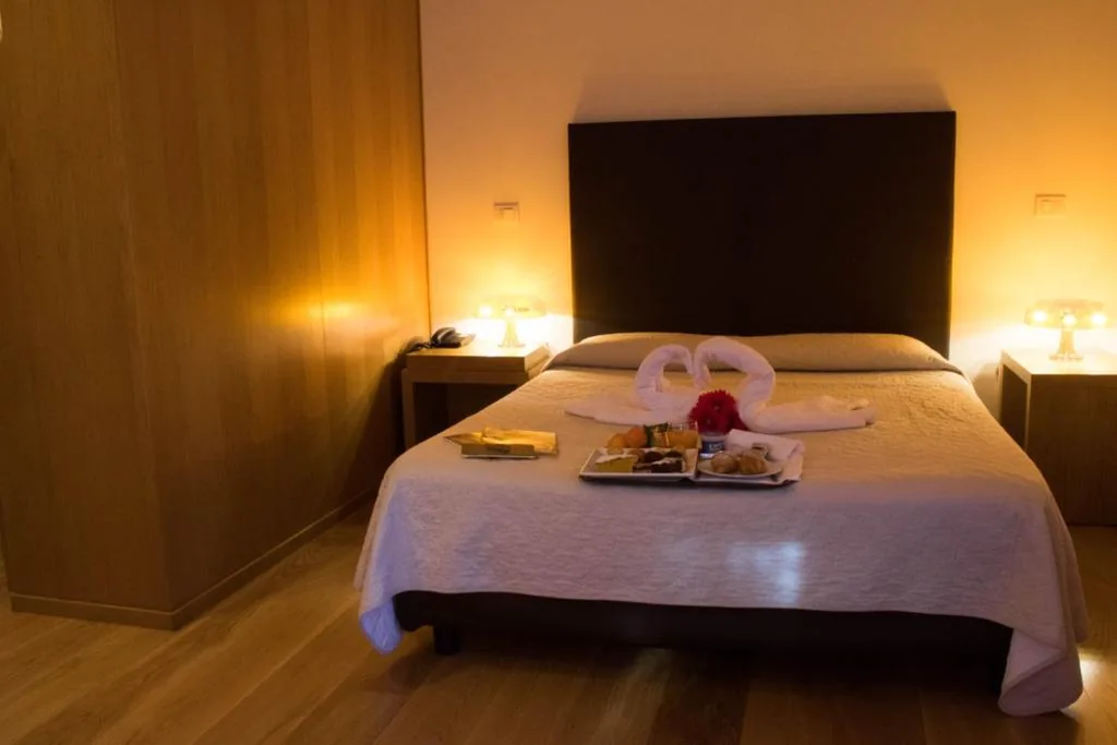 Deluxe Triple Room — Le Querce Hotel