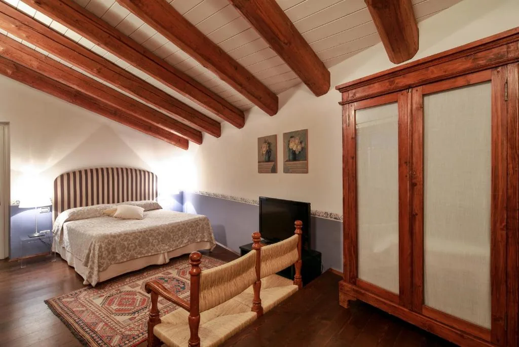 Deluxe Room — Locanda Orologio