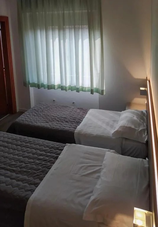 Twin Room — Hotel Friuli