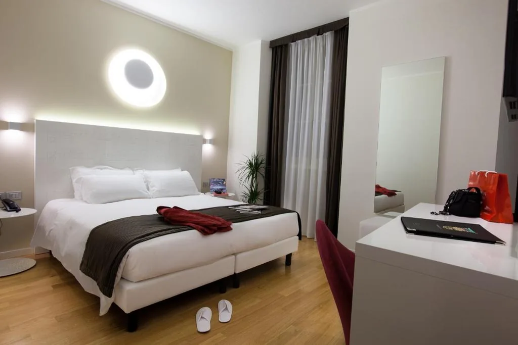 Camera Matrimoniale Deluxe — Hotel Coppe Trieste – Boutique Hotel