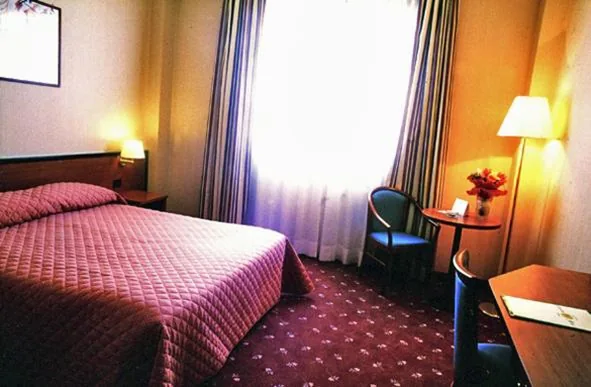 Camera Matrimoniale — Hotel Executive Meeting & Events