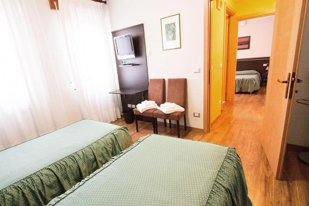 Camera Quadrupla Comfort — Al Benvenuto Hotel & Restaurant