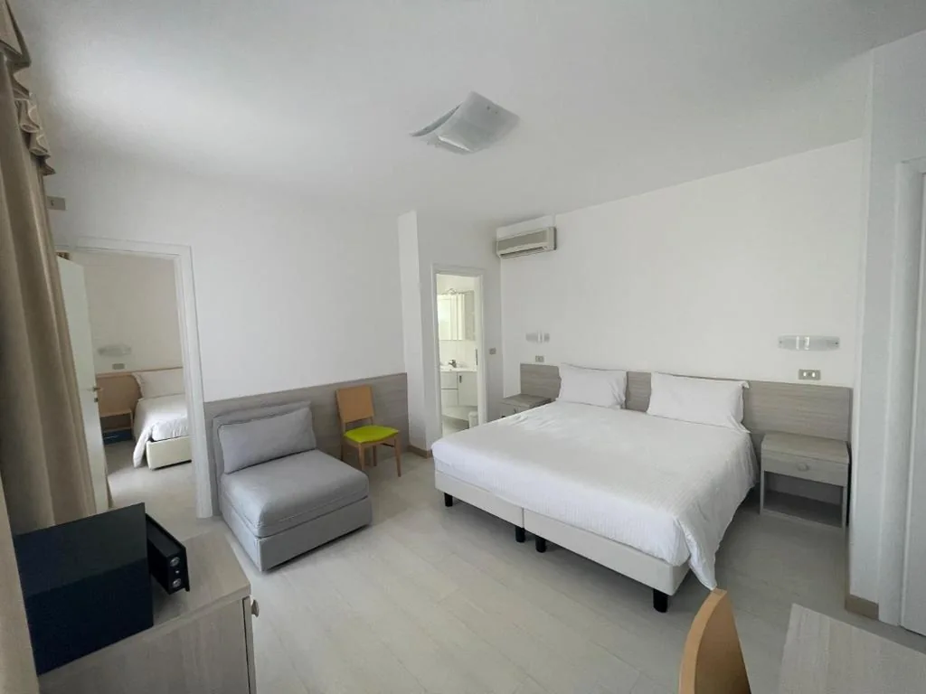 Comfort Quadruple Room — Hotel Athena