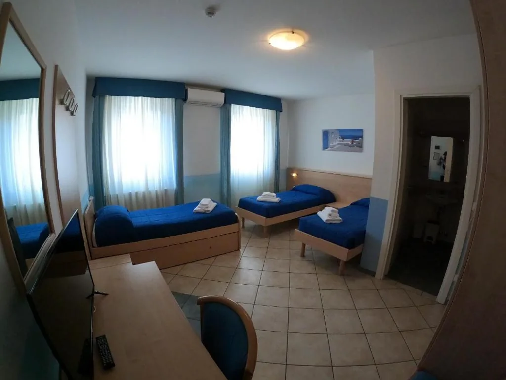 Quadruple Room with Bathroom — Albergo La Caravella