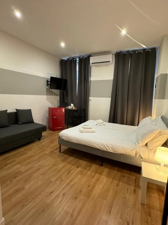 Camera Quadrupla con Bagno Privato — Il Tasso Rooms & Apartments