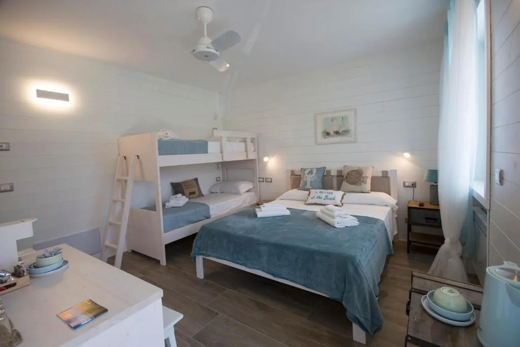 Camera Quadrupla con Bagno Privato — Laura e Christian – Rooms