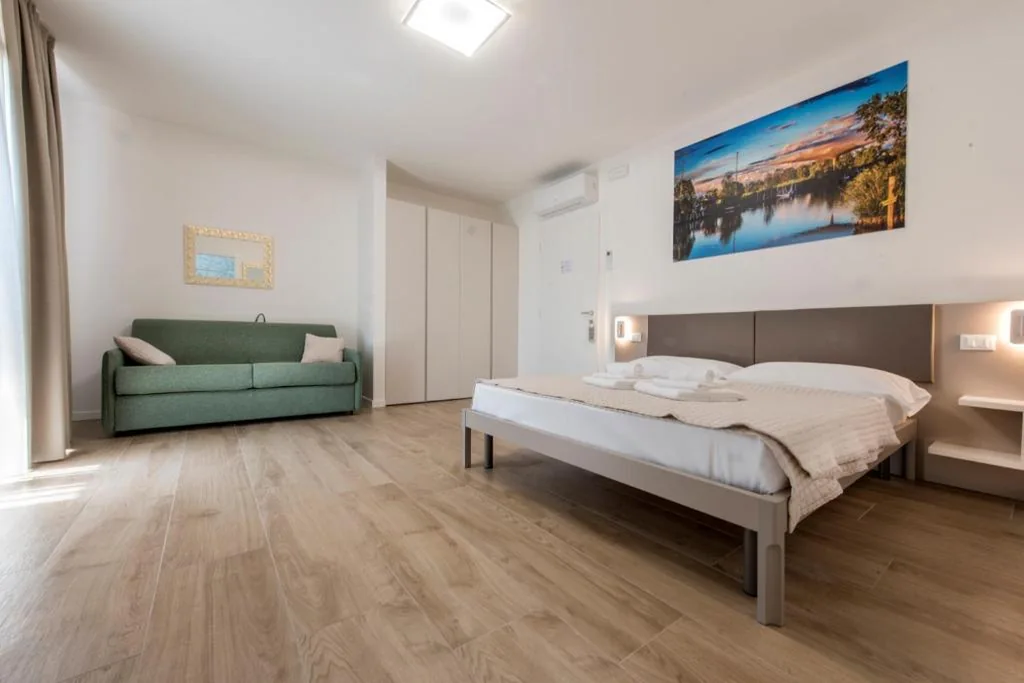 Camera Quadrupla Deluxe — Guesthouse Stadio