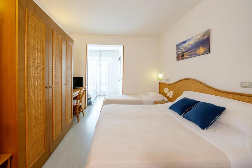 Quadruple Room — Hotel Capri