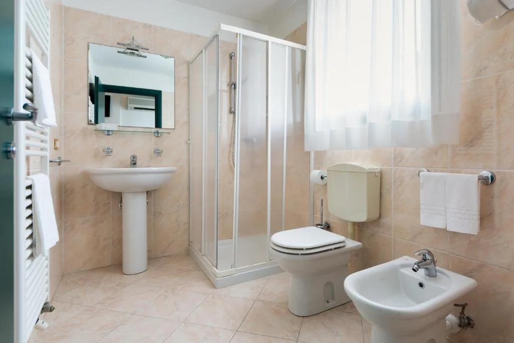 Quadruple Room — Hotel Centrale