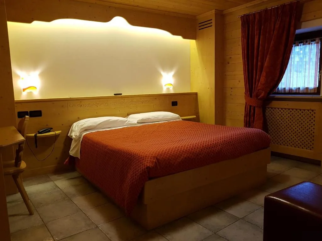 Quadruple Room — Hotel Raibl e Appartamenti