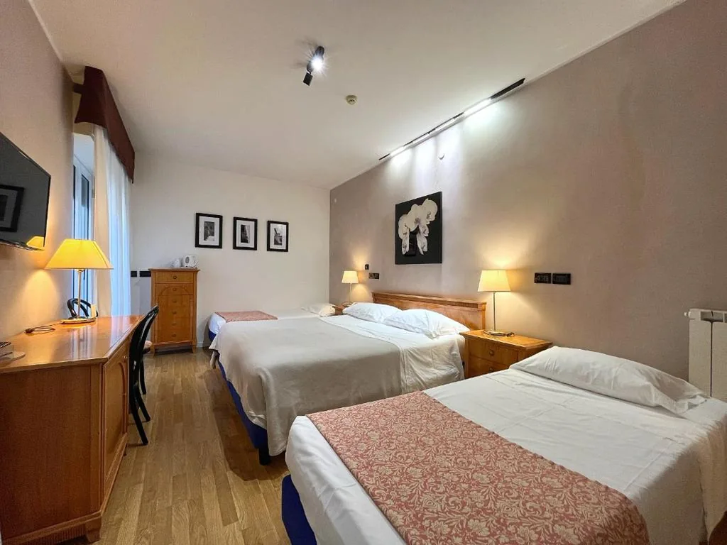 Quadruple Room — Hotel Regina