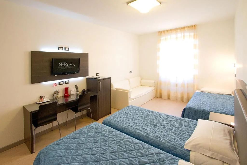Quadruple Room — Hotel Roma