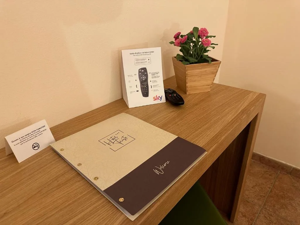 Quadruple Room — Hotel Trieste