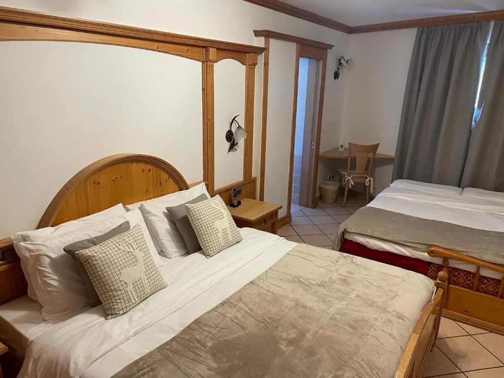 Quadruple Room — Hotel Valle Verde – Rent Ski & Bike