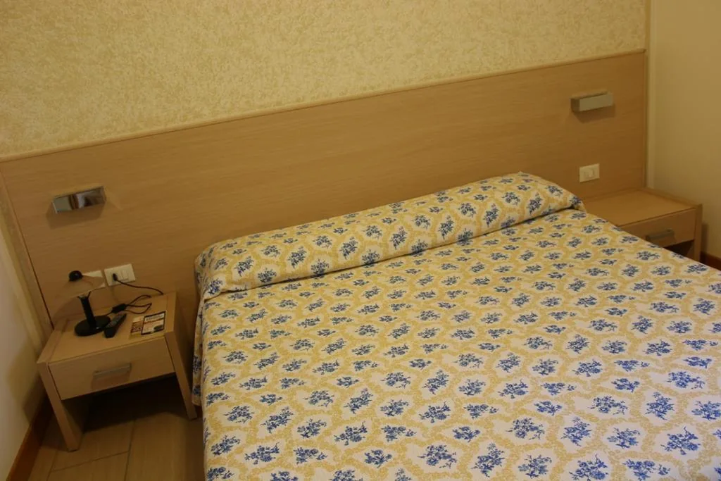Superior Quadruple Room with Kitchenette - Dependance — Hotel Ristorante Cigno – Camere and Aparthotel