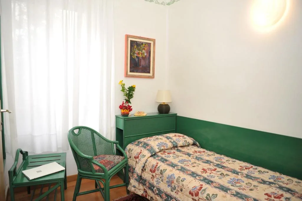 Single Room — Hotel Diana