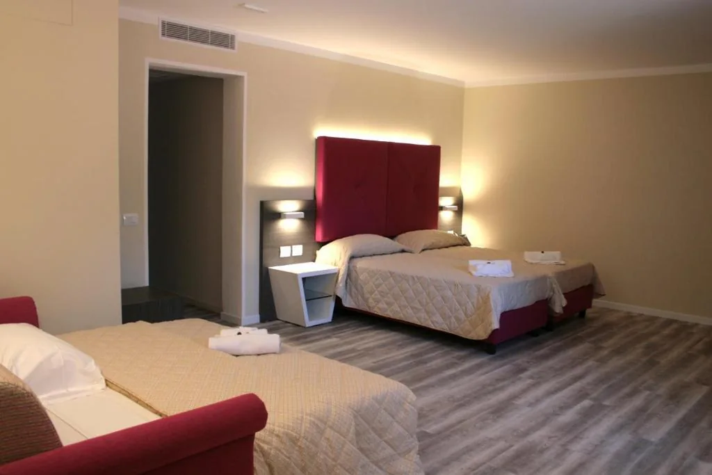 Triple Room — Alma Living Hotel- Al Girarrosto
