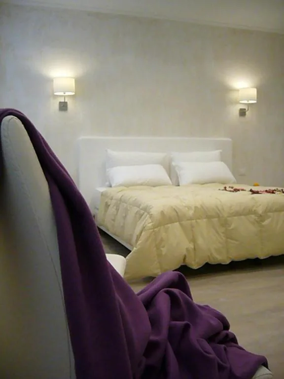 Triple Room with Private Bathroom — Grignetti Bed