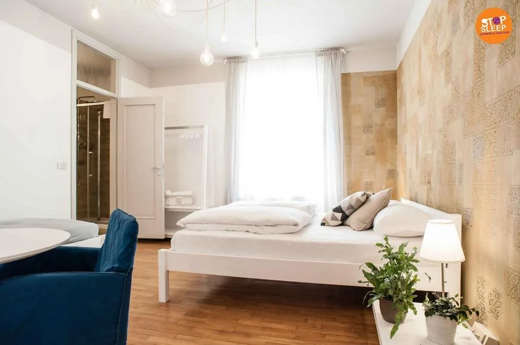Triple Room with Private Bathroom — Stop & Sleep Venzone