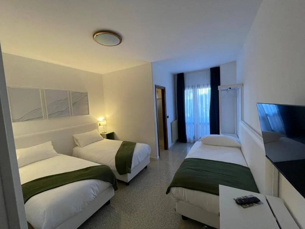 Triple Room with Balcony — Casa Valcellina Hotel Ristorante