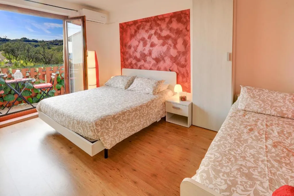 Camera Tripla con Balcone — Dal Rosso