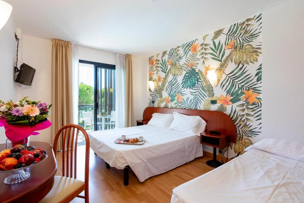 Triple Room with Balcony — Hotel Falcone