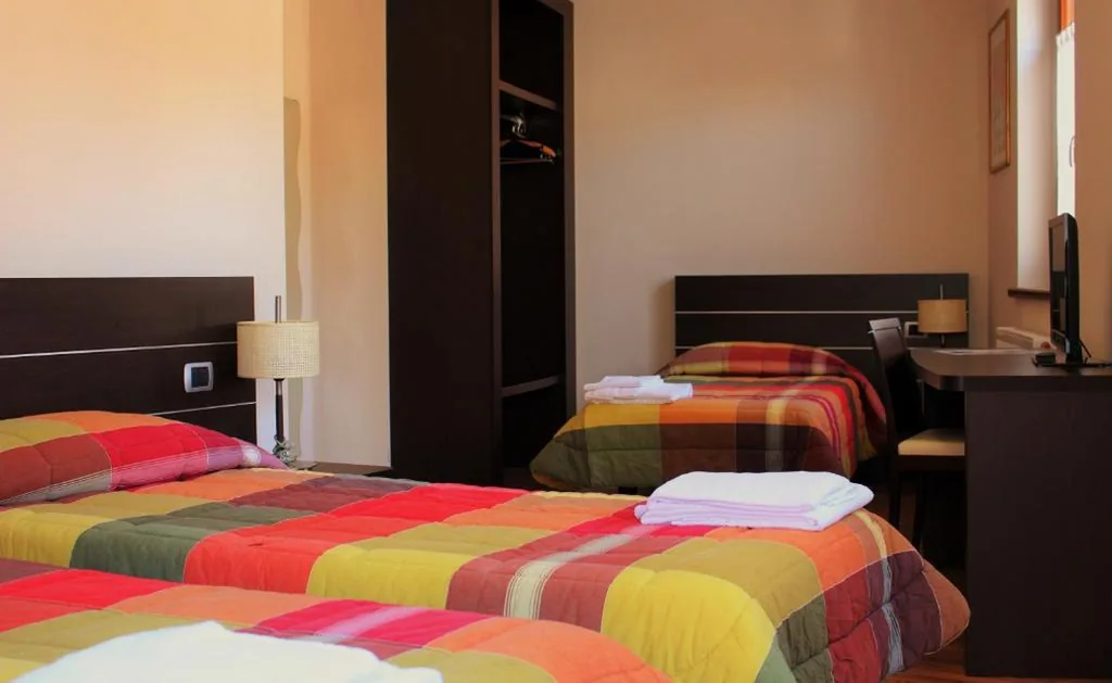Triple Room with Terrace — Al Fogolâr Rooms & Osteria with Saunaland