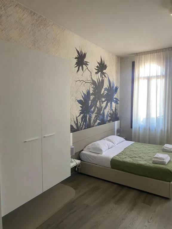 Triple Room with City View — Albergo Leon D’Oro