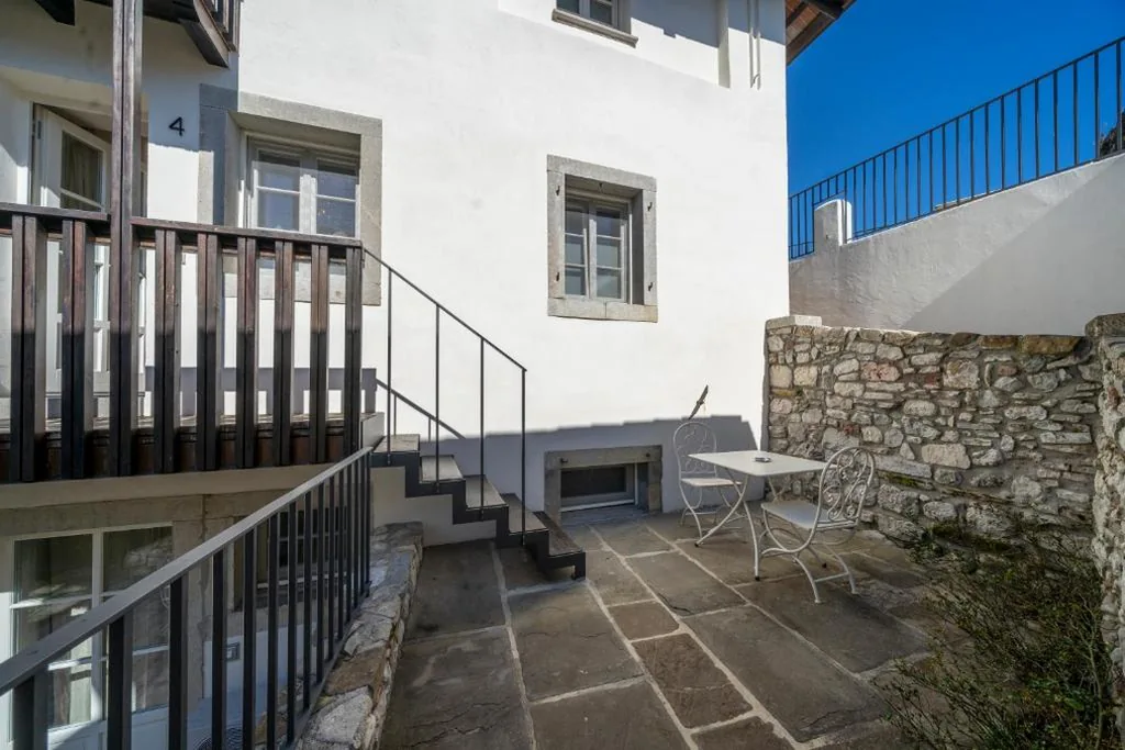 Camera Tripla con Vista Giardino — Casa vacanze alle Mura